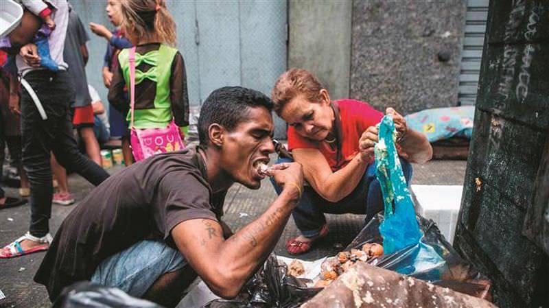 video – drama din venezuela - oamenii cumpără carne stricată de foame. morții putrezesc la morgă