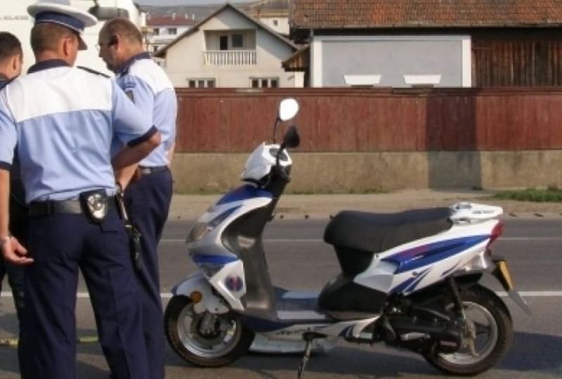 copil prins de polițiști pe moped la tălmaciu