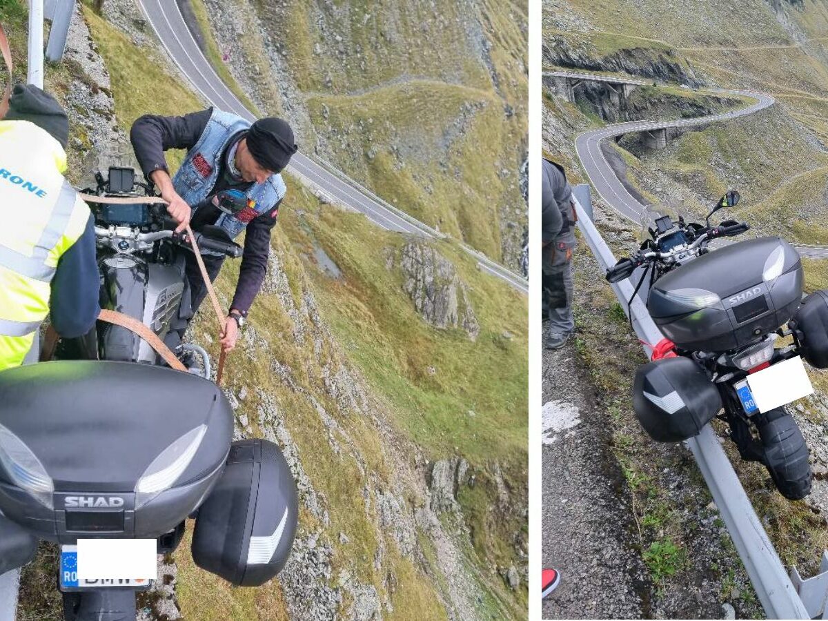 VIDEO Motociclist american, suspendat după un parapet pe Transfăgărășan - A derapat pe o pată de ulei