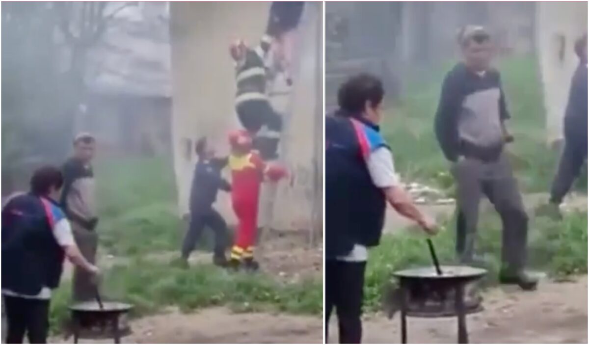 video: imagini incredibile la mediaș - o femeie gătește la ceaun lângă un bloc cuprins de flăcări
